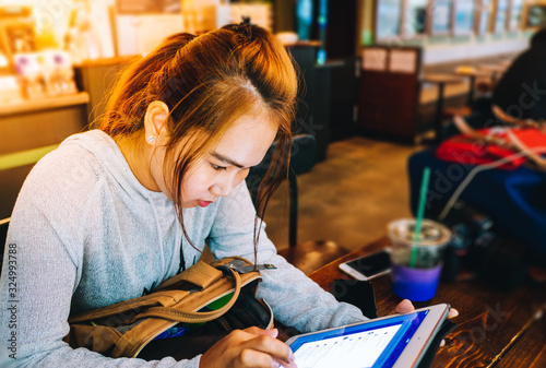 young girl reading a book