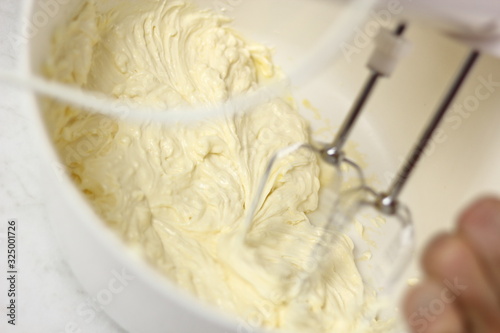 Whisking cheese filling with mixer. Making Lemon Mascarpone Pie Series.