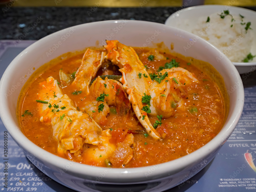 Close up shot of a bowl of Cajun style seafood Close up shot of a bowl of Cajun style seafood