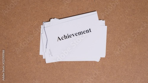 stop motion, fast changing pile of decks of CORE VALUE words on paper cards