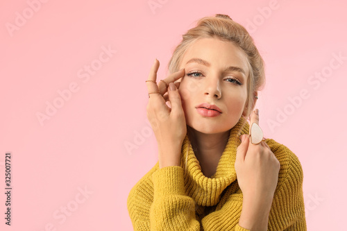 Young woman in warm sweater...