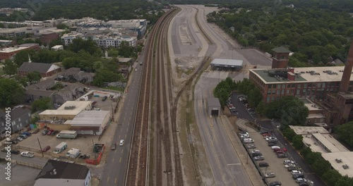 Atlanta Aerial v551 Descending overtop train tracks near cotton mill lofts moving very low over Hulsey Yard toward Reynoldstown - August 2019 photo