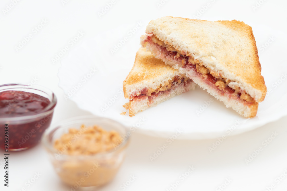 Sandwich with jam and peanut butter, delicious breakfast Sandwich with jam and peanut butter, delicious breakfast