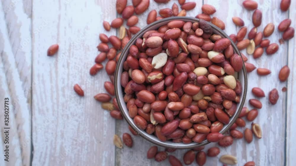 top view of fresh peanut in a bowl 