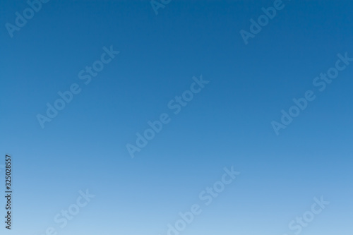 Clear winter blue sky as background.