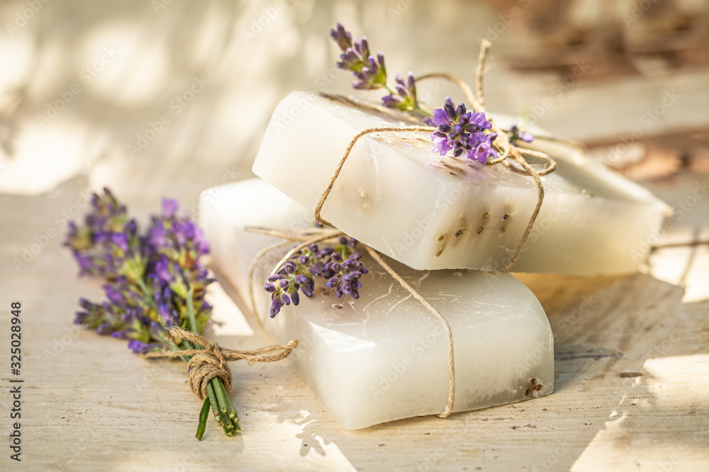 Natural cubes of lavender soap on white chair - obrazy, fototapety, plakaty 