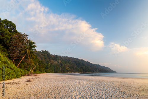 Radhanagar beach long exposure during sunset on the island of Havelock (Swaraj Dweep) in the Andaman and Nicobar Islands of India.
