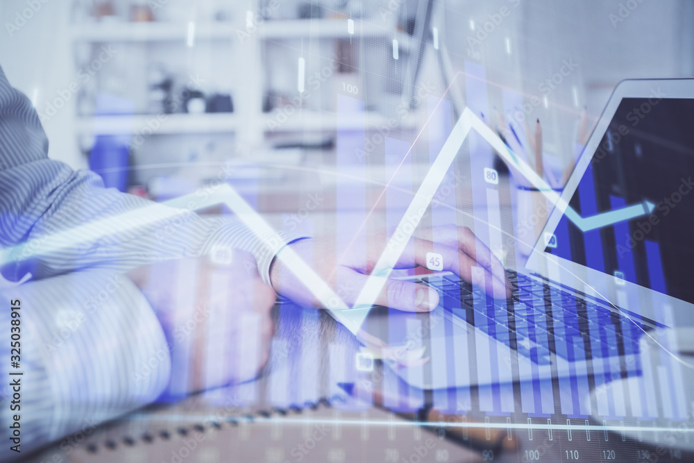 Multi exposure of stock market chart with man working on computer on background. Concept of financial analysis. Multi exposure of stock market chart with man working on computer on background. Concept of financial analysis.