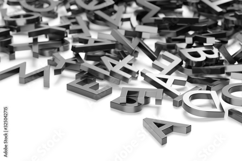 Heap of metal alphabetic character letters over white background, literature, education, know-how or writing concept, selective focus