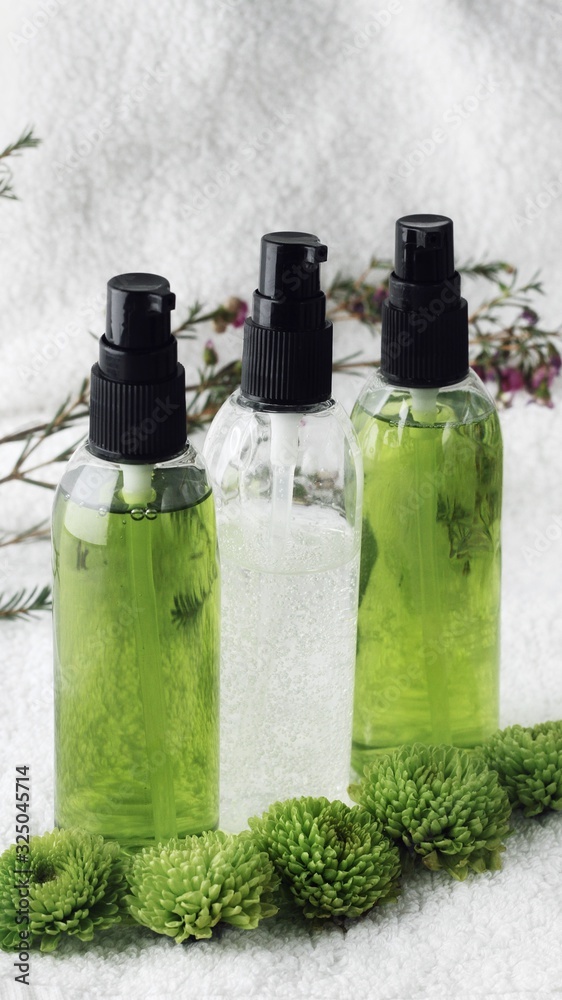 Organic skincare products on minimalistic SPA background with copy space