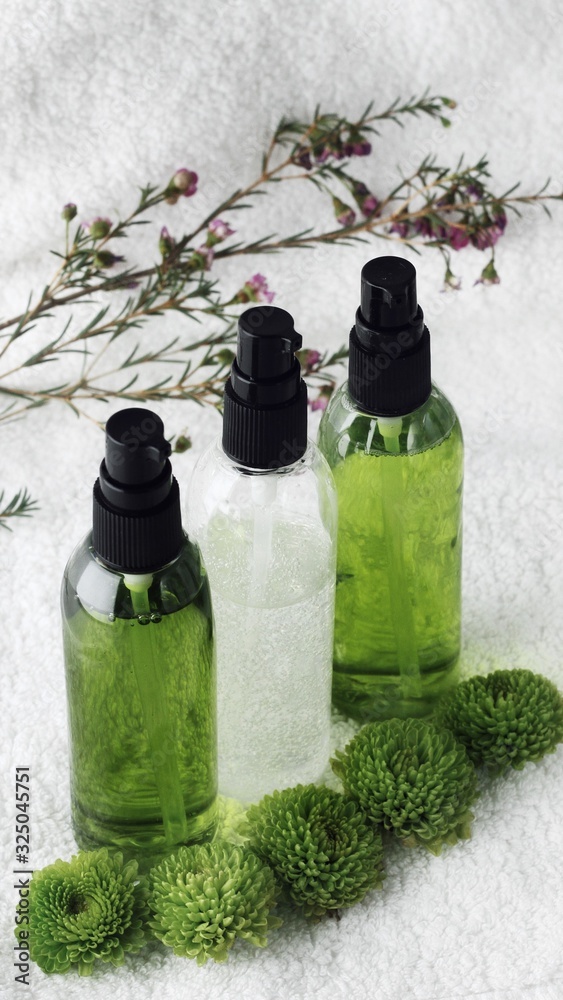 Organic skincare products on minimalistic SPA background with copy space