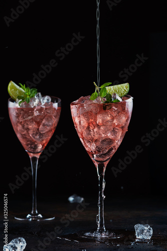 Summer cocktail with rose wine