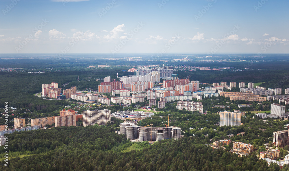 Beautiful summer panoramic landscape. Bird's-eye view of microdisricts in Krasnogors