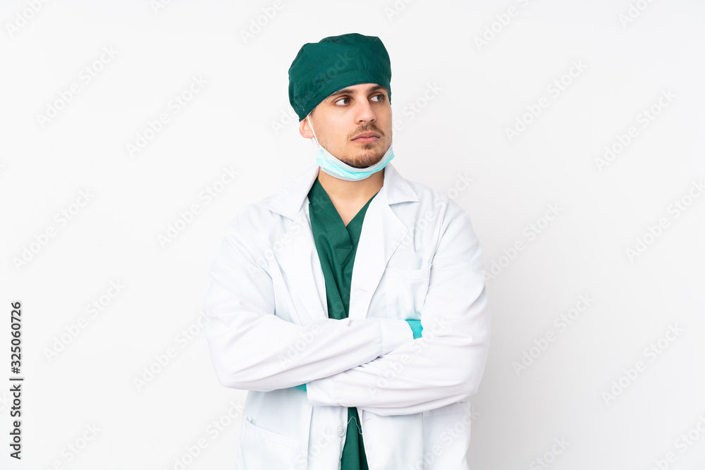 Surgeon in green uniform isolated on isolated white background portrait Surgeon in green uniform isolated on isolated white background portrait