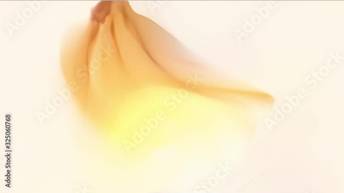 yellow bananas random motion fluid colors abstract backdrop -  photo