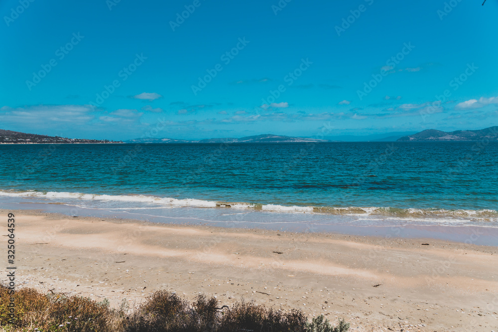 landscape in South Arm Beach near Opossum Bay on a sunny summer day with nobody on the beach