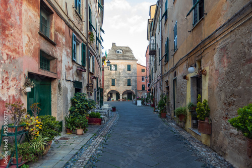 View along narrow street in the medieval village of Finalborgo, Liguria region, Italy © Dmytro Surkov