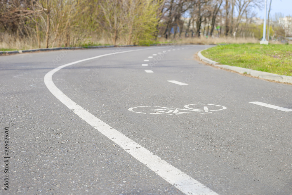 bike path in spring park. Empty road