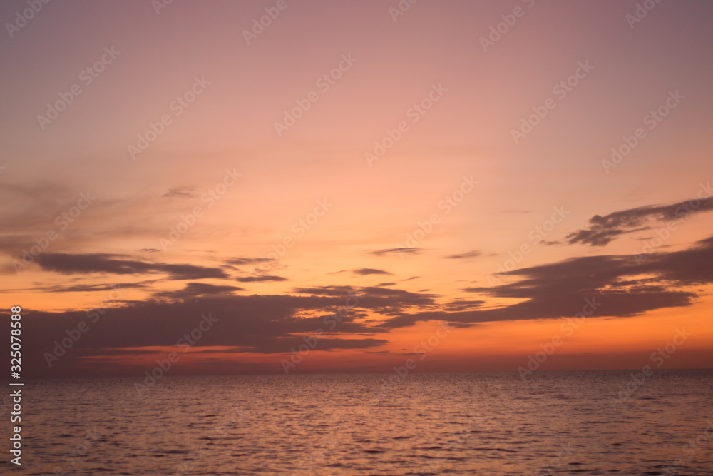 Beautiful pink color clouds on the sky.