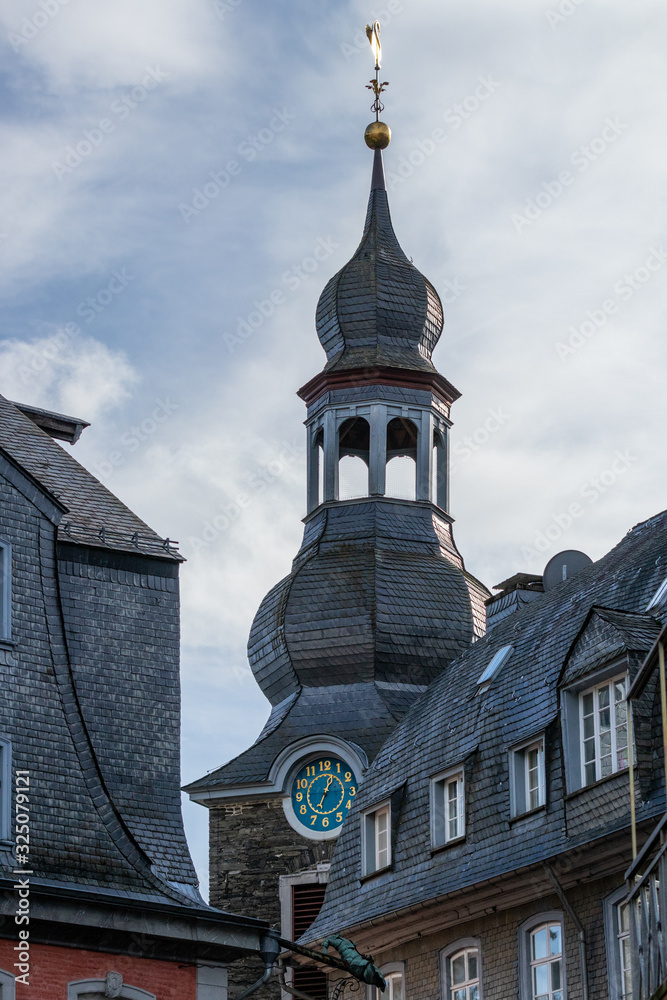View on the church spire with golden swan in Monschau, Eifel