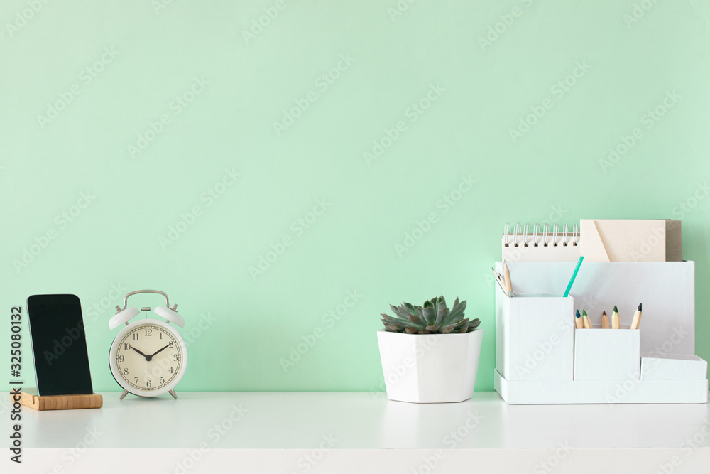 School desktop in modern style with Blank space. Modern home interior design on green background. School desktop in modern style with Blank space. Modern home interior design on green background.