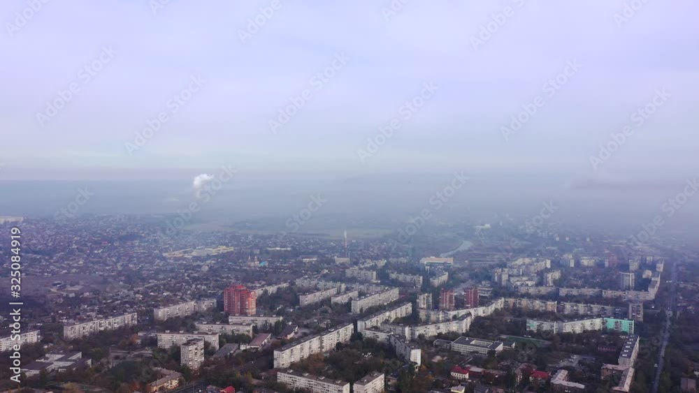 City in the fog. Aerial view. City in the fog. Aerial view.