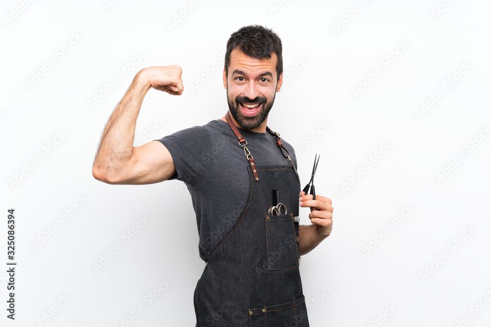 Barber man in an apron doing strong gesture Barber man in an apron doing strong gesture