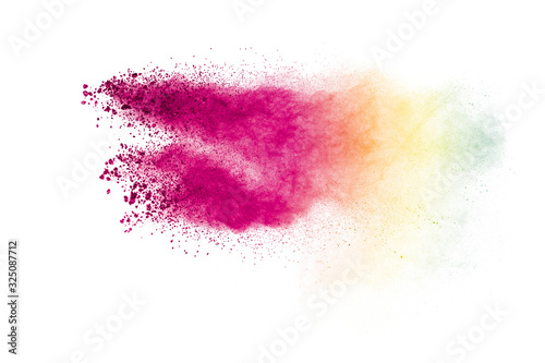 Fototapeta Colorful powder explosion on white background. Abstract pastel color dust particles splash.
