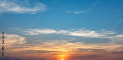 sunrise in blue sky background © lovelyday12