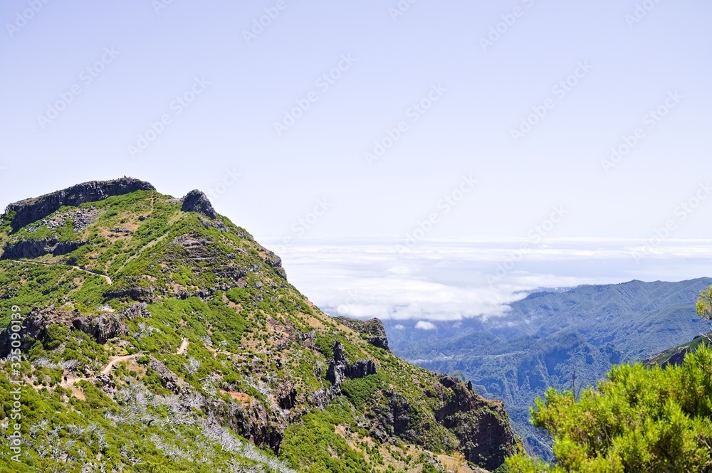 Fototapeta premium Cloudscape panoramic view from the peak of mountain (Madeira Island, Portugal, Europe)