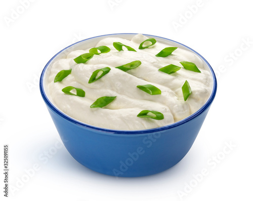 Sour cream with onion isolated on white background