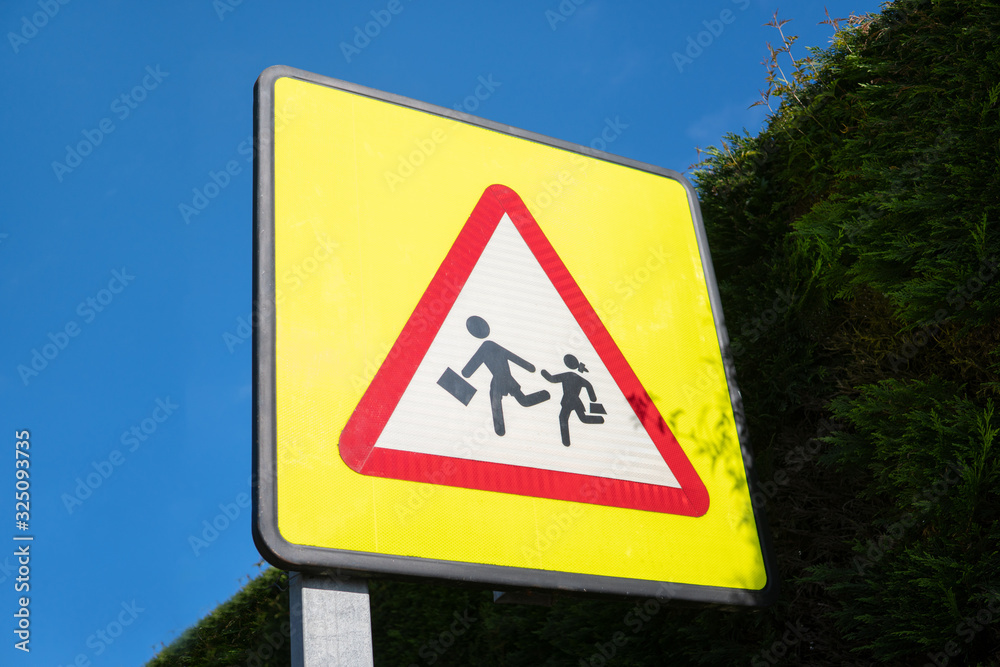 Colorful Beware of children in the school area sign. School warning sign