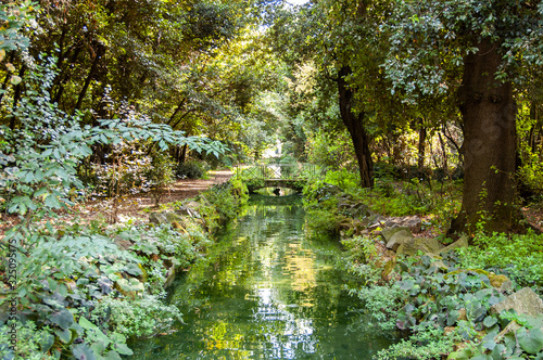 Canal with bridge  view of Caserta Royal Palace and Park  Italy