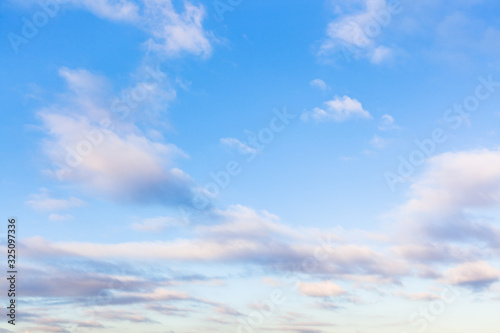 Fototapeta Naklejka Na Ścianę i Meble -  low clouds in blue sky in evening twilight