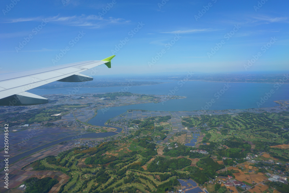 Approach Tokyo Narita airport. Air travel. VIew from an airplane window Approach Tokyo Narita airport. Air travel. VIew from an airplane window