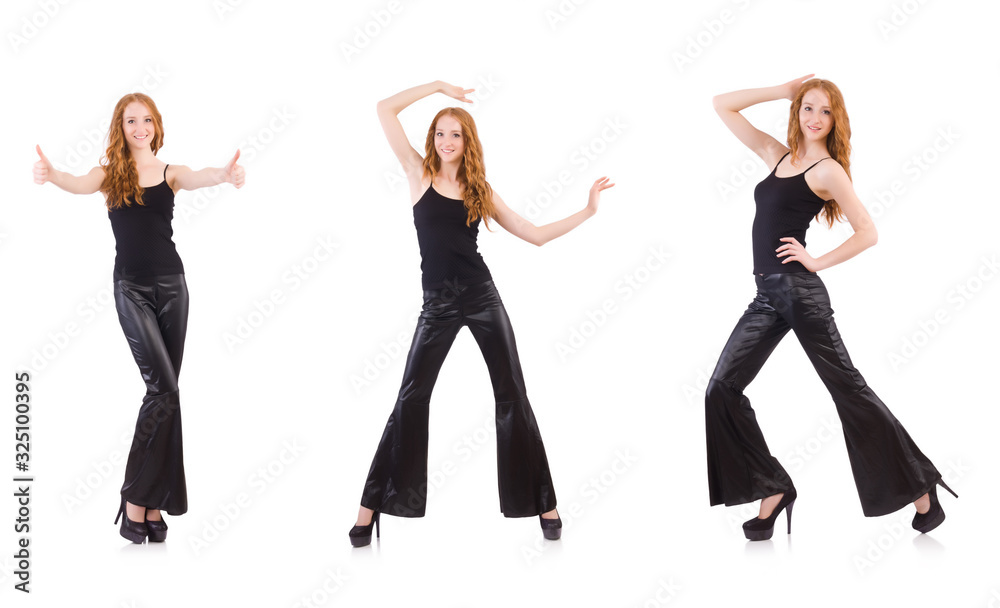 Redhead woman in black bell bottom pants on white Redhead woman in black bell bottom pants on white