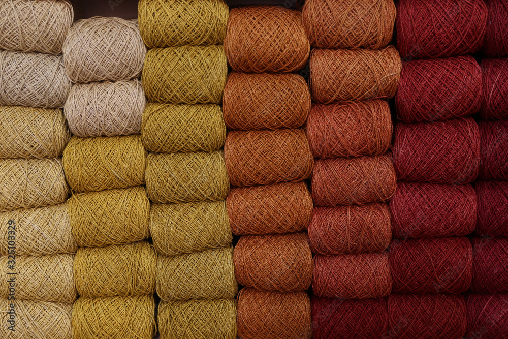 yarn dyed with natural colors - obrazy, fototapety, plakaty 