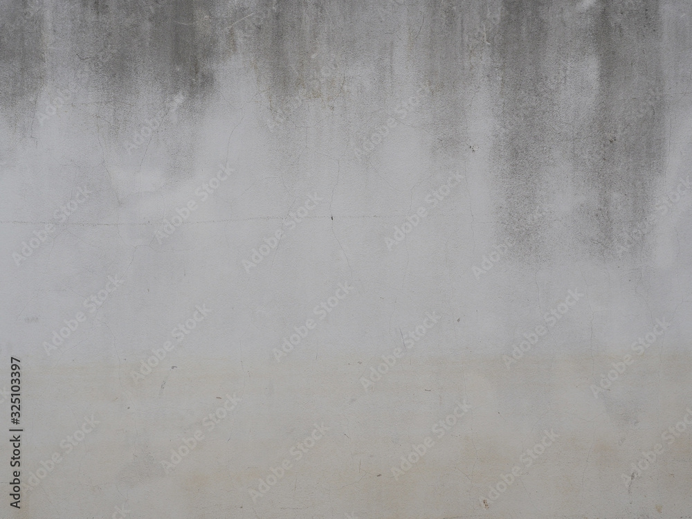 concrete wall or stone texture with scratches,cracks and stains for background.Have copy space for text.