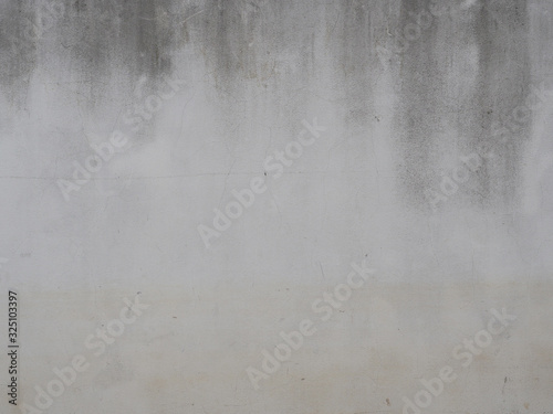 concrete wall or stone texture with scratches cracks and stains for background.Have copy space for text.