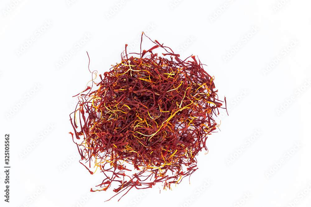 Fototapeta premium Cenital view of saffron threads isolated on white background.