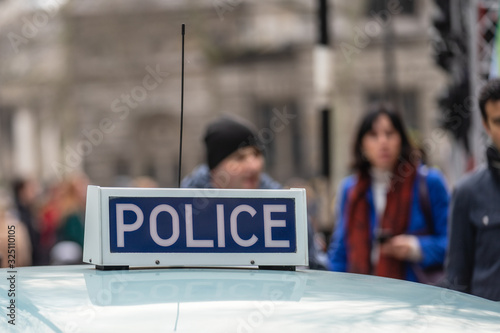 Police sign on an Austin patrol car.Vintage police car top lights.AUSTIN1300 Police Panda car