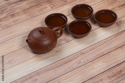 Tea set. Clay tea pot with clay tea cups