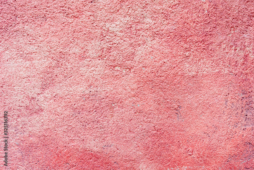 Fototapeta premium Old concrete cement wall painted in red