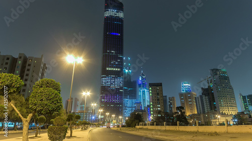 Tallest building in Kuwait City timelapse hyperlapse - the Al Hamra Tower at dusk. Kuwait City, Middle East photo