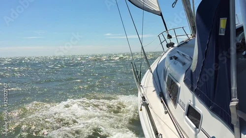Sailing Yacht bashing through waves