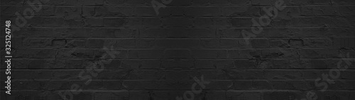 Dark black anthracite damaged rustic brick wall texture banner panorama 