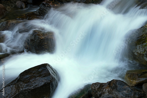 Landscape of a cascade on Boulder Creek  captured with motion blur  Front Range  Rocky Mountains  Colorado  USA