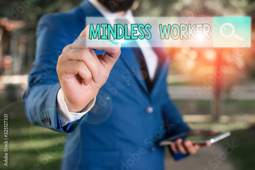 Word writing text Mindless Worker. Business photo showcasing Having no intelligent purpose Showing little attention photo