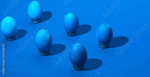 isometric easter eggs layout. classic blue monochromatic composition. hard shadows