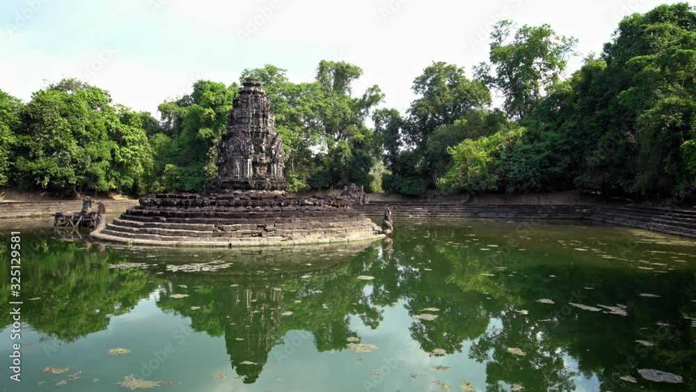 4K, Neak Pean Ancient monument ruins in Cambodia Angkor Wat temple complex. A religious architecture landmarks buildings in Siem Reap built by Khmer empire. A popular tourist destination in Asia.-Dan 4K, Neak Pean Ancient monument ruins in Cambodia Angkor Wat temple complex. A religious architecture landmarks buildings in Siem Reap built by Khmer empire. A popular tourist destination in Asia.-Dan